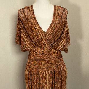 Beauty of a dress. Form fitting. Love it.